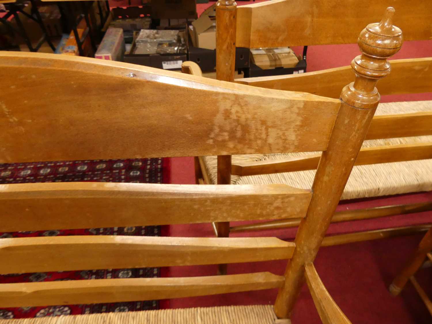 A set of four early 20th century elm and beech ladder back and rush seated two-seater settles, - Image 7 of 13