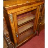 A Victorian figured walnut, gilt metal mounted and floral satinwood inlaid single door glazed pier