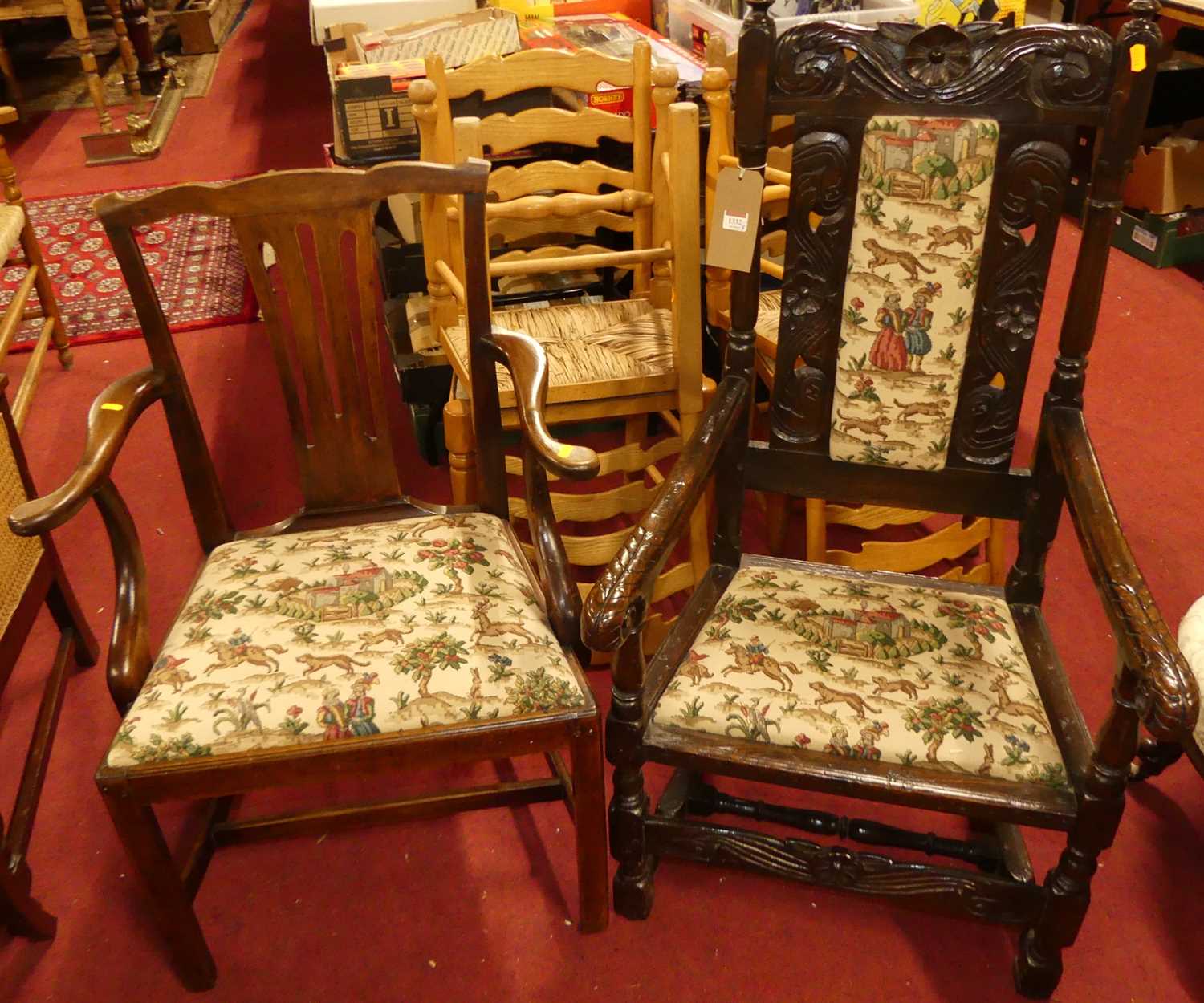 An antique joined and relief carved oak single elbow chair in the 17th century taste, together