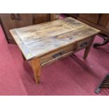 A contemporary elm plank topped rectangular low occasional table, having twin frieze drawers, length