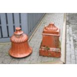 A terracotta classical style urn planter on square stepped base (recently snapped at lower part of