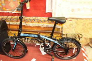 An Ammaco Pakka foldable portable bicycle (appears little used)