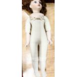 A large Bru.j No. 13 bisque headed and soft filled doll, length 72cm