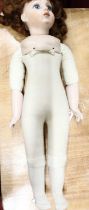 A large Bru.j No. 13 bisque headed and soft filled doll, length 72cm