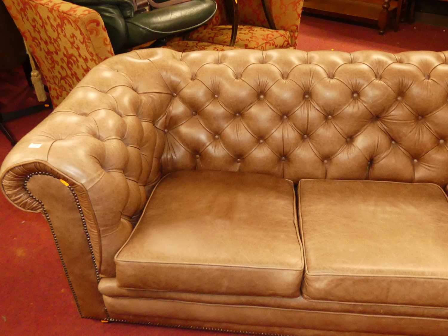 A contemporary tan leather buttoned upholstered three-seater Chesterfield, having squab cushions, - Image 3 of 4