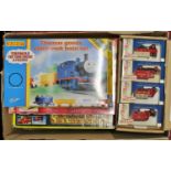 A box of mixed vintage and modern release battery operated and clockwork trains, to include a Hornby