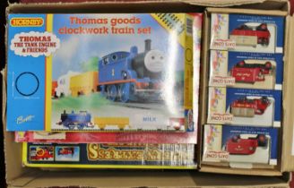 A box of mixed vintage and modern release battery operated and clockwork trains, to include a Hornby