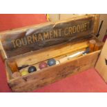 A Slazenger of London croquet set, the metal bound pine box containing four mallets, four coloured