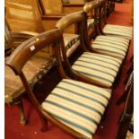 A set of four 19th century rosewood bar back dining chairs, each having striped floral upholstered