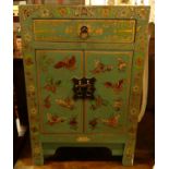 An Eastern painted and gilt decorated double door bedside cupboard, having single upper drawer,