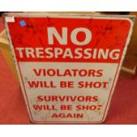 A lithograph printed tin sign 'No Trespassing', 70 x 50cm