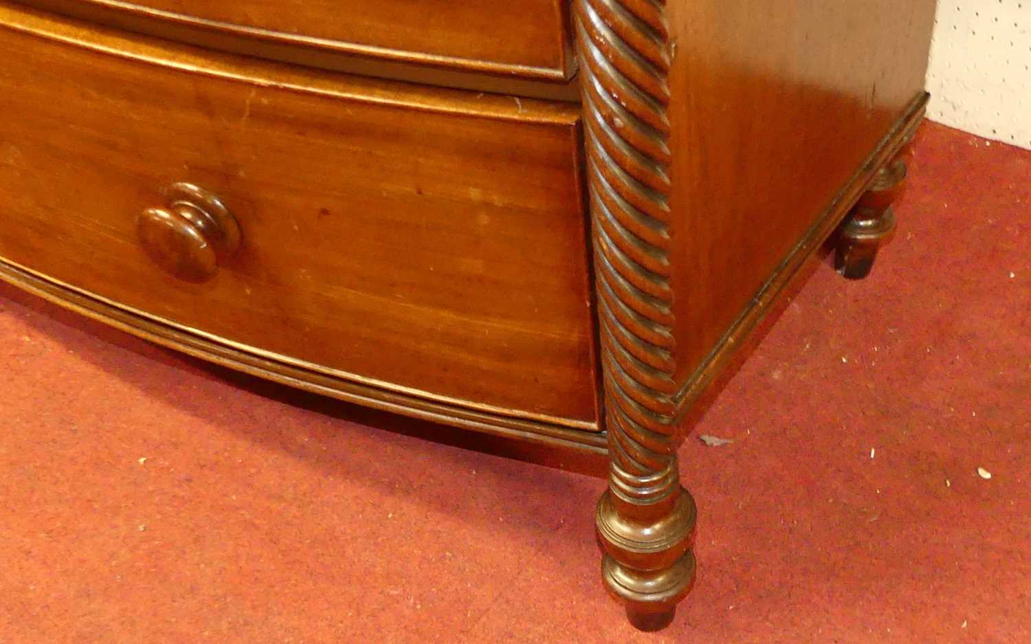 A Regency mahogany bowfront chest, of two short over four long graduated drawers within spiral - Image 4 of 4