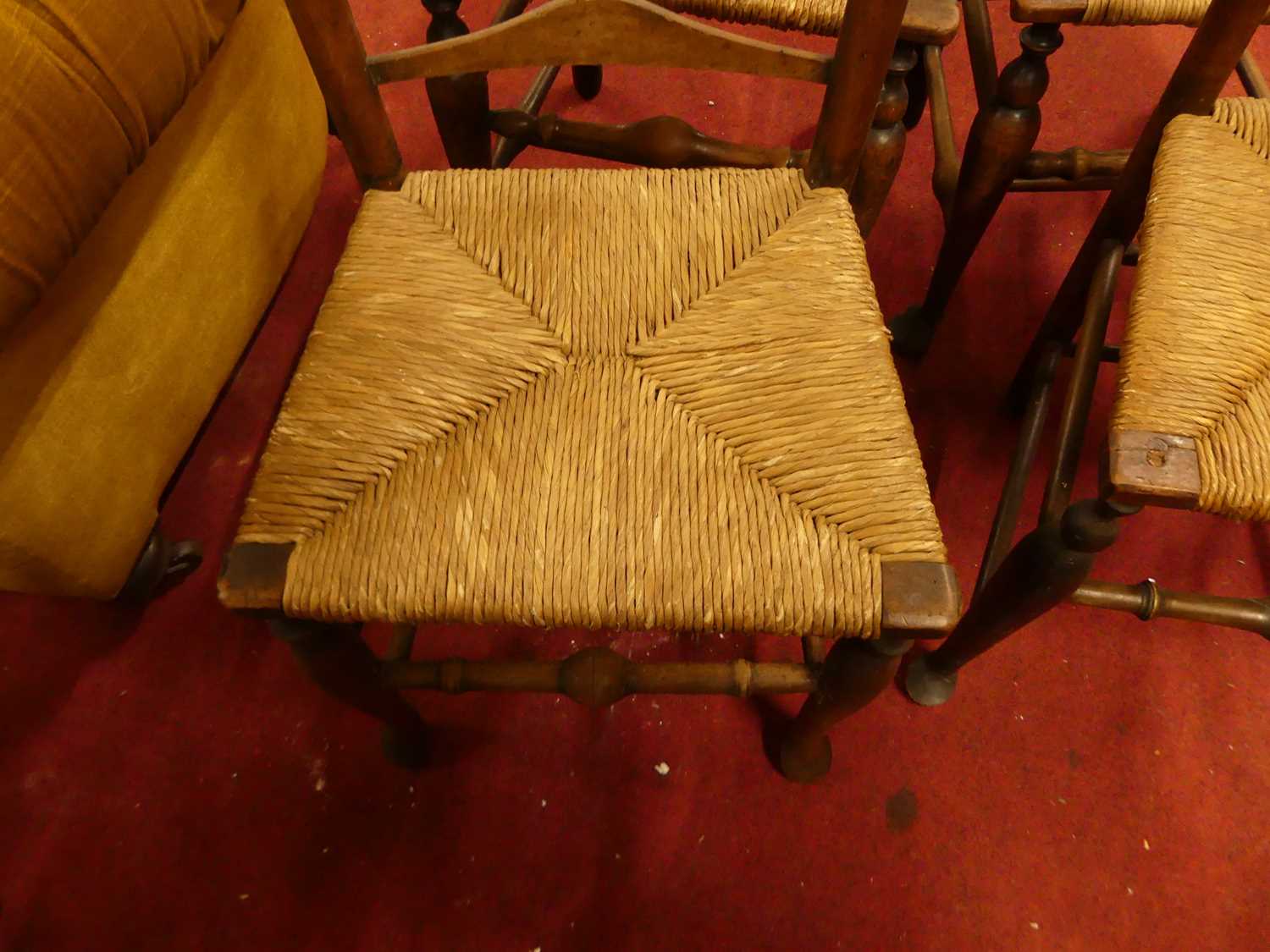 Four provincial elm and beech ladder back rush seat kitchen chairs Loose in the joints and wobbly. - Image 3 of 4