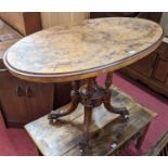 A mid-Victorian figured walnut and floral satinwood inlaid oval pedestal loo table, length 106cm