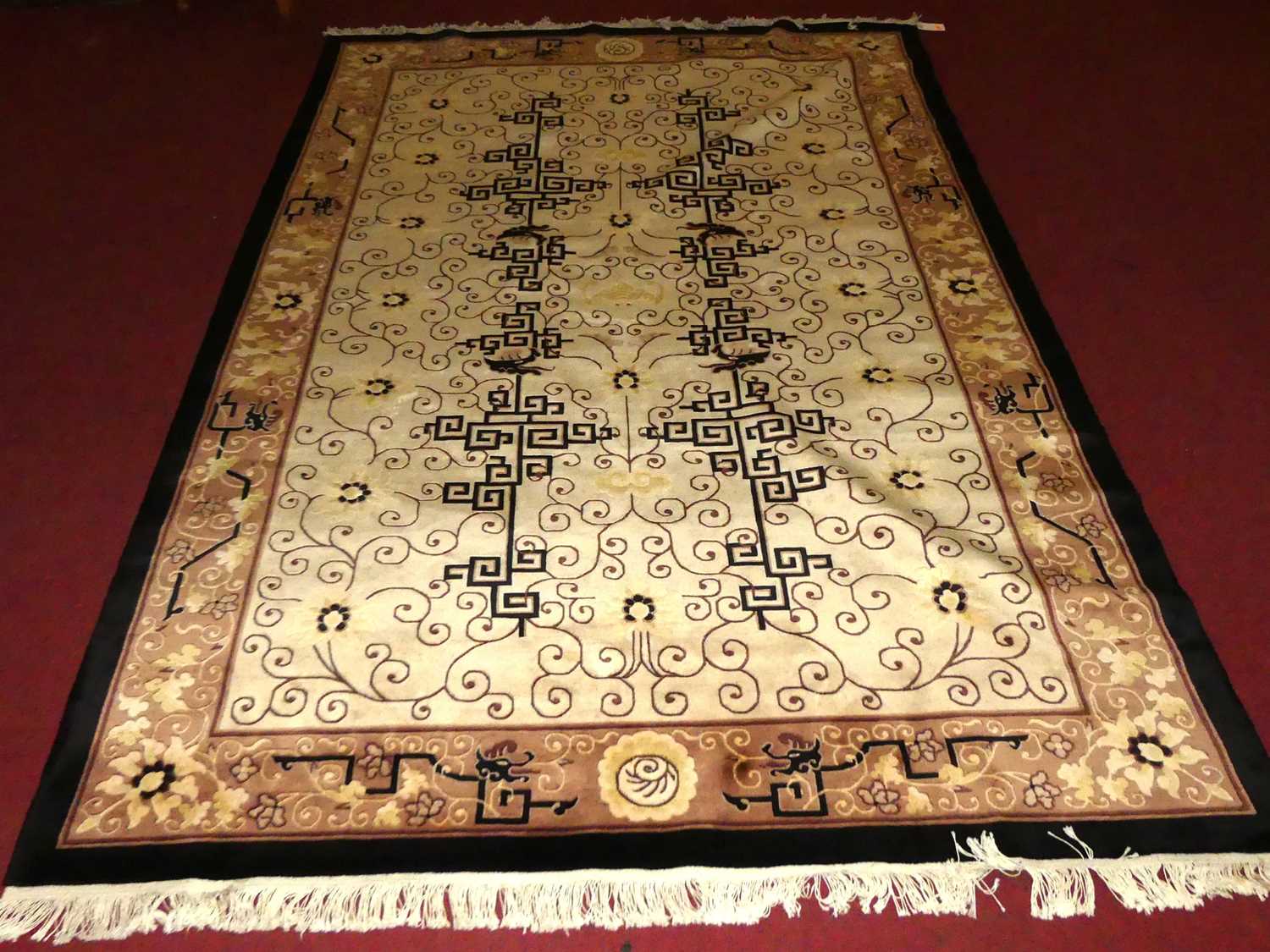 A Chinese cream ground Superwash carpet, 275 x 182cm