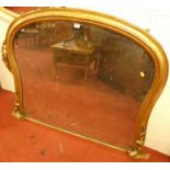 A mid-Victorian giltwood framed arched overmantel mirror, having floral lower detail, 96 x 130cm