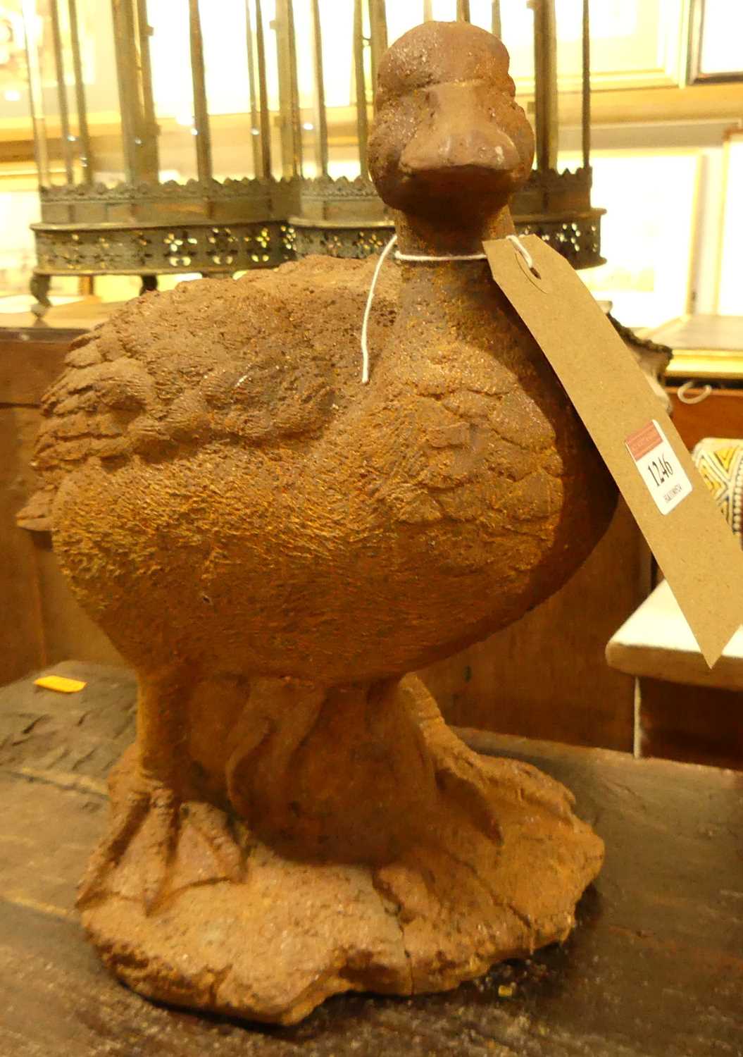 A contemporary cast iron garden figure of a standing duck, length 32cm