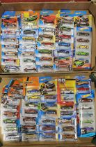 Two trays of Matchbox and Hot Wheels modern release vehicles, to include a Ford Mustang GT, 1967