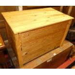 A modern planked pine hinge topped toy chest, w.69.5cm