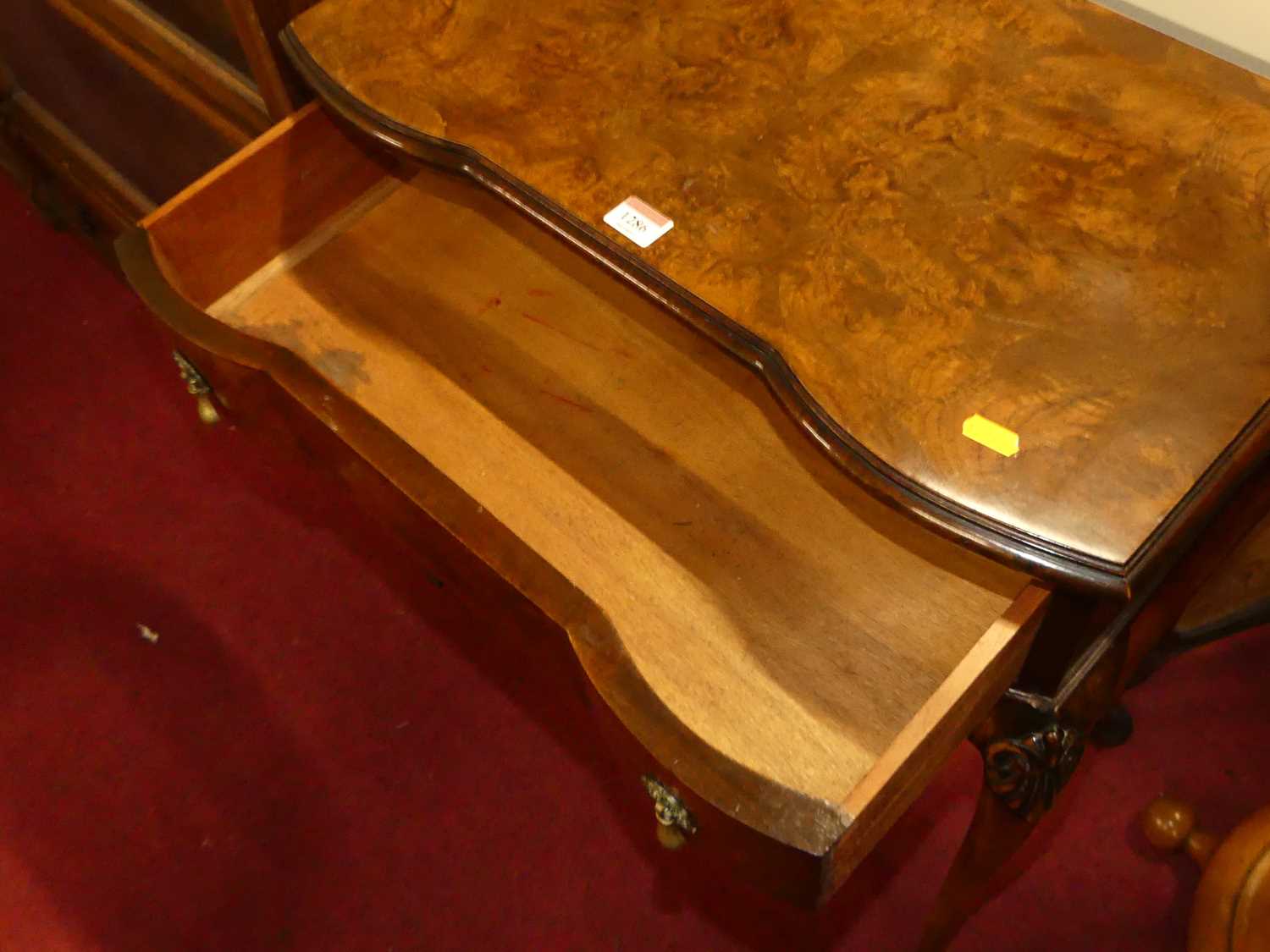 A 1930s figured walnut serpentine single drawer side table, raised on shell capped cabriole - Image 3 of 4