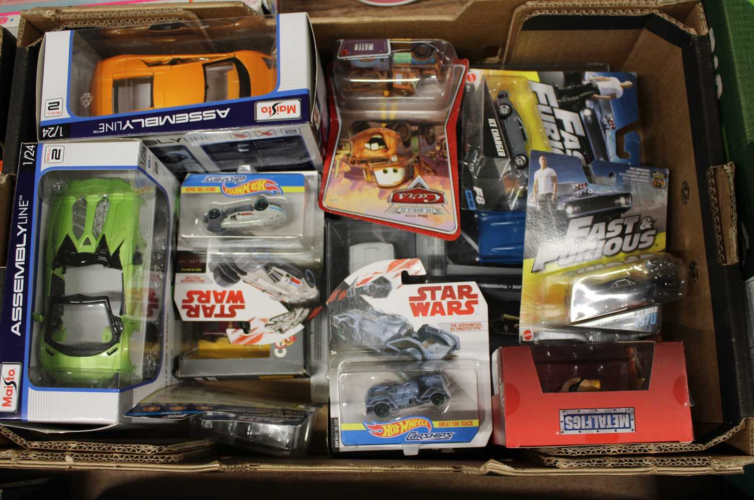 A tray of boxed modern issue diecast, to include Star Wars Hot Wheels, The World of Cars by Disney