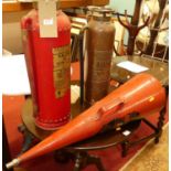 A copper fire extinguisher by The Empire Fire Extinguisher Company, together with a Valor fire