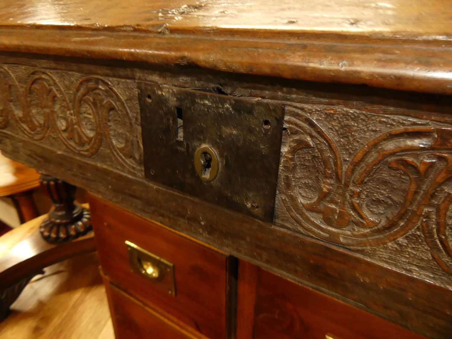 An 18th century oak slopefront hinged Bible box, having relief carved front panel, exposed iron - Image 2 of 5