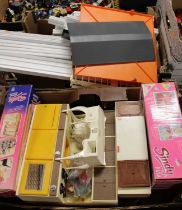 Three boxes containing a quantity of Sindy accessories to include the Sindy bath, dining dresser,