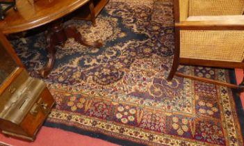Two Persian style machine woven Tabriz rugs, each of good size, the blue ground example 365 x 275cm,
