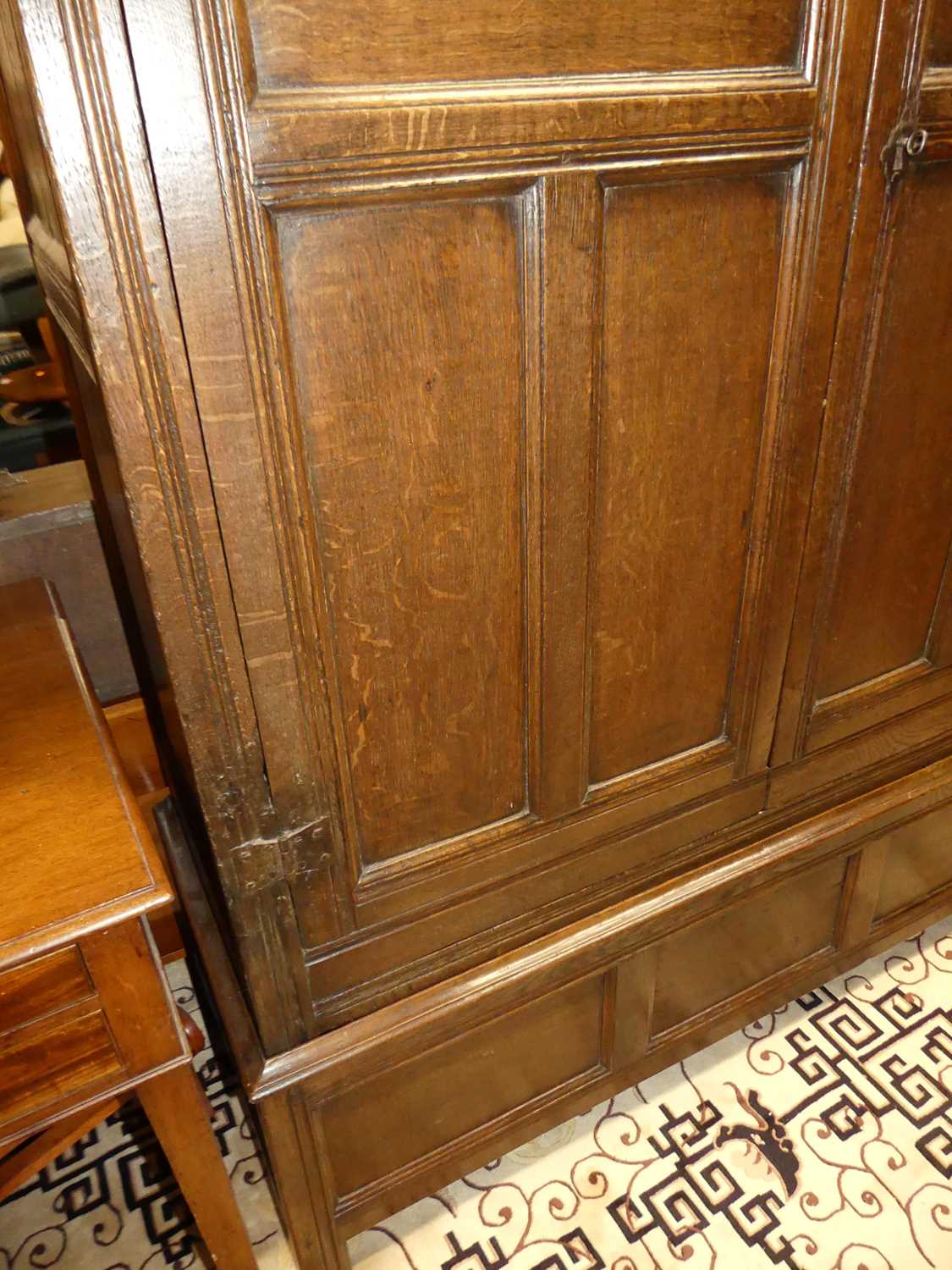 An antique joined oak double door panelled side cupboard, w.128cm - Image 3 of 5