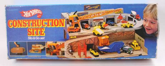 A Hotwheels Stop & Go No. 4100 construction site gift set in the original box Box not sealed, has