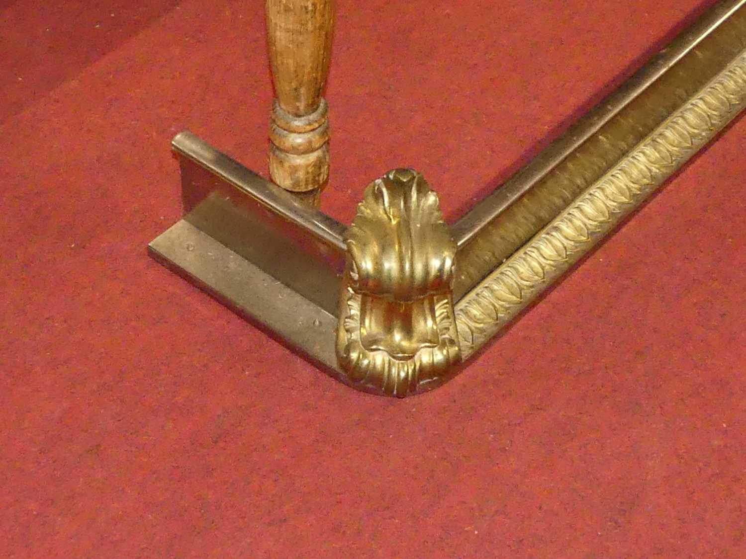 A 19th century steel and gilt brass fire fender in the classical taste, having floral scroll - Image 2 of 3