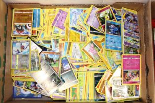 A tray containing a quantity of Pokemon trading cards