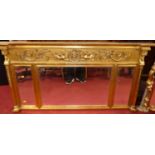 A reproduction gilt composition chimney mirror, having triple bevelled plates and neo-classical