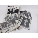 A collection of vintage photographs, mainly band promotion photos, together with signatures relating