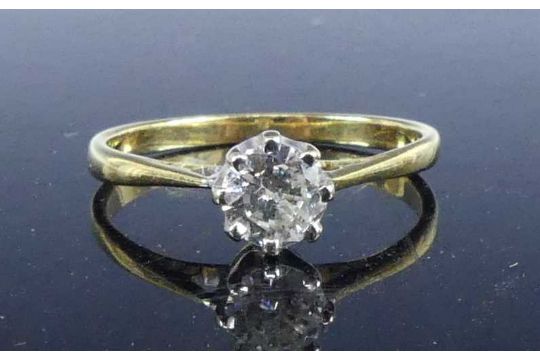 A yellow and white metal diamond solitaire ring, featuring a round brilliant cut diamond in an - Image 2 of 6