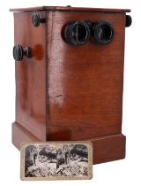 An early 20th Century mahogany table model multi-view stereoscope and Great War stereocards