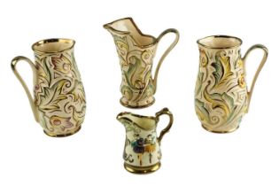 Three mid to late 20th Century Wade "Gothic" jugs together with a similar Wade "Festival" jug, 23 cm