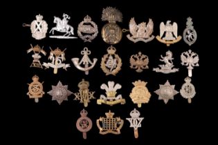 A collection of British army cavalry and yeomanry badges etc