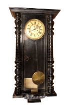 An early 20th century ebonised Vienna wallclock by Gustaf Becker, having a twin weight movement