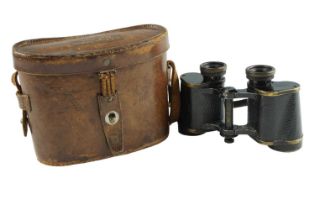 A pair of vintage Carl Zeiss of Jena 12x field glasses in a Dollond of London hide case