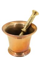 An 18th / 19th Century cast bronze mortar together with a later brass pestle
