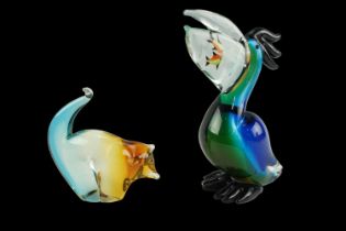 A Studio glass pelican, 26 cm, together with a Lemur or similar animal