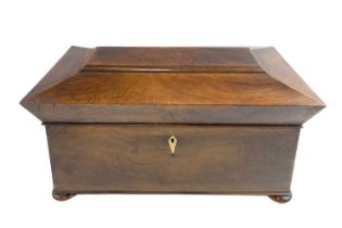 A Regency sarcophagus form rosewood tea caddy, the interior having a pair of removable tea canisters