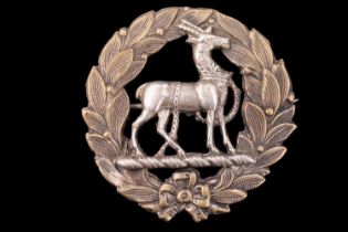 A variant Hertfordshire Regiment cap badge, (loops replaced with brooch pin), 45 mm x 44 mm