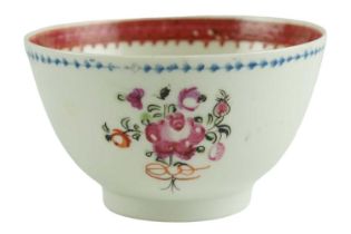 A late 18th Century Lowestoft polychrome floral decorated porcelain tea bowl, 9 x 5 cm