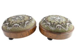 A pair of Victorian rosewood-veneered beadwork footstools on ceramic feet, 28 cm diameter