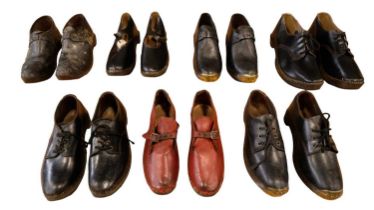 Seven pairs of late 19th / early 20th Century clogs