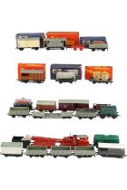 A group of Hornby Dublo and Triang OO gauge rolling stock, Esso and Shell tank cars, etc