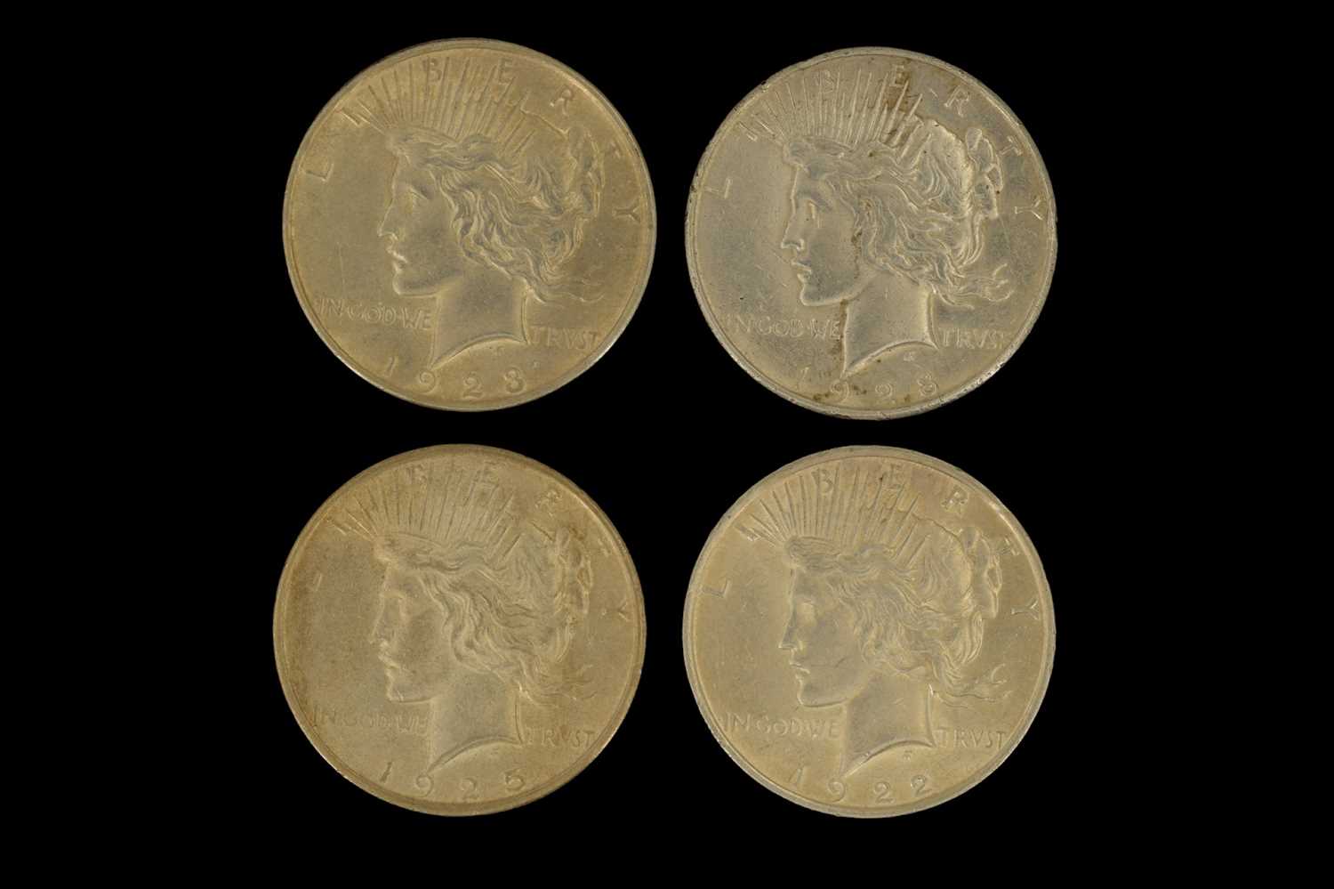 Four silver US "Peace Dollar" one dollar coins, comprising a 1922 (normal relief), 1923, 1925, and - Image 2 of 2